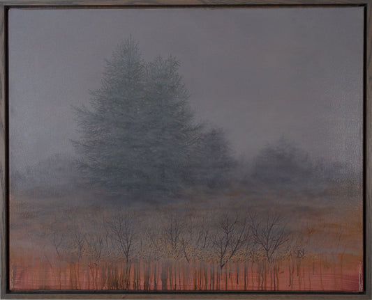 Framed artwork of a landscape with trees and a misty sky.